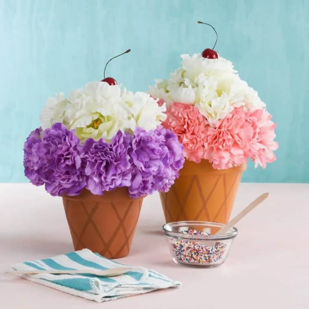 Sur Pinterest Make a super cool clay pot floral arrangement that everyone will be
